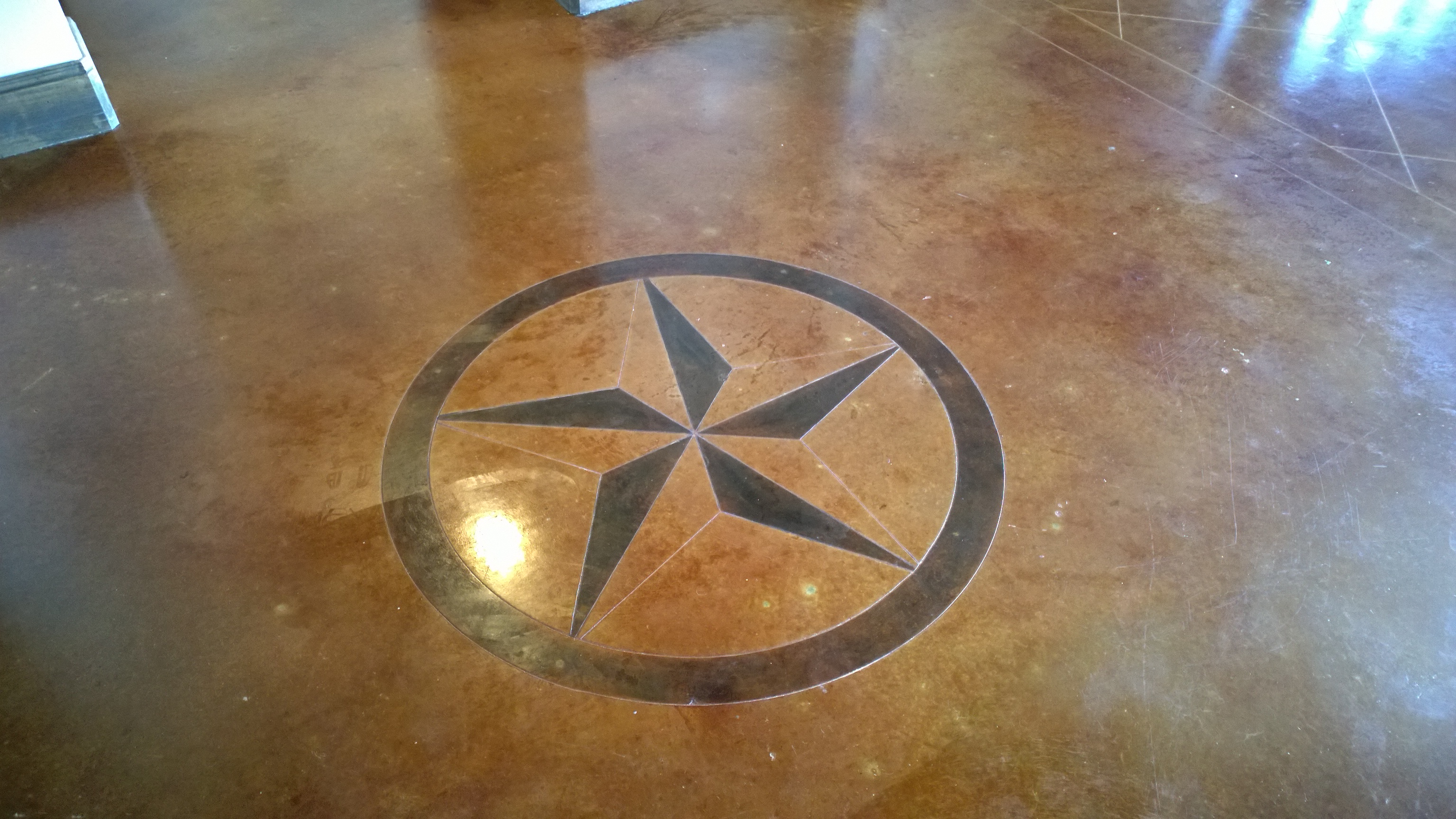 Norwich Homes 2983 Penninsula Stained Concrete Floor Medallion